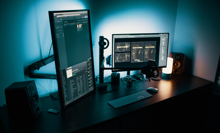 Different monitors positioning for graphic design professional.