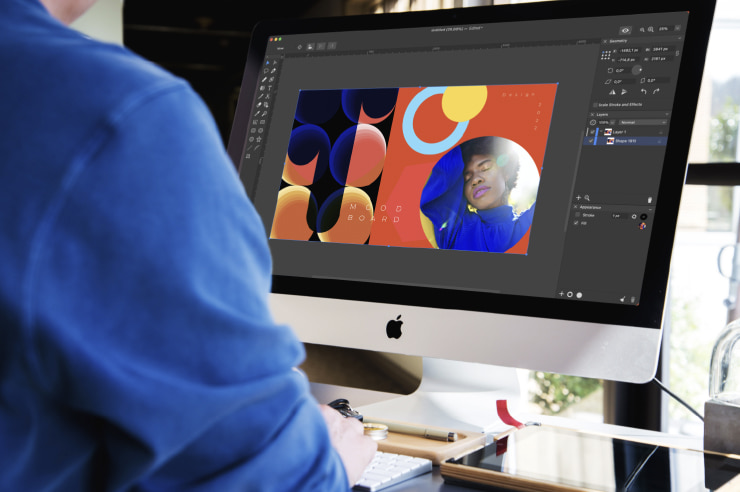 Graphic designer at work in the Amadine app on an iMac.