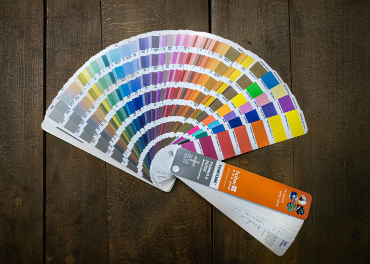Pantone matching system color reference. Photo by Mika Baumeister on Unsplash